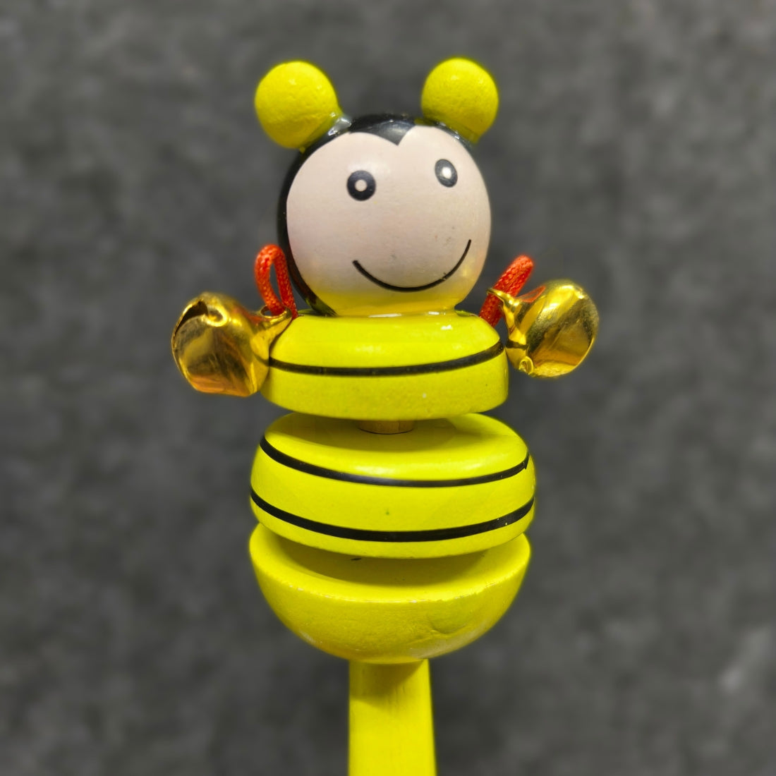 Handcrafted eco-friendly wooden baby rattle
